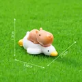 Miniature capybara riding a duck figurine for DIY garden decor, size 3.6x2.1x1.7cm - Capybara Riding Duck