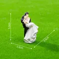 Miniature wedding groom carrying bride figurine for DIY dollhouse and desktop decoration - Couple Figurines / Black/White