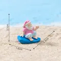 Figura de Papá Noel surfeando para decoración de micro paisajes de playa en verano - Papá Noel Surfeando