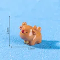Miniature Christmas reindeer ornament with 2.6cm by 3.3cm dimensions - 2.6x3.3cm