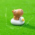 Miniature brown capybara figurine sitting on a white duck floatie for garden decor - 3# Swimming Ring Capybara