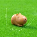 Capybara miniature figurine on green grass with dimensions 2.9cm x 1.6cm x 1.9cm - 4# Stretching Capybara