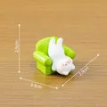 Cute miniature white cat figurine on a green sofa, size 3.4cm x 2.9cm x 2.5cm - Green Sofa Cat / Green