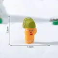 Miniatura omino di pan di zenzero natalizio con cappello verde per decoro 3,8cm - 2# Portatore di Pan di Zenzero 1 / 3.8x1.9cm