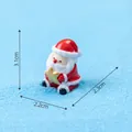 Figurine de Père Noël miniature avec étoile dorée sur sable bleu, 3,1x2,2x2,3cm - Père Noël Assis avec Étoile Dorée / Étoile