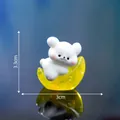 Miniature white puppy lying on a yellow crescent moon figurine, size 3.3cm by 3cm - Lying on Moon (2#)