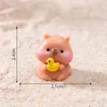 Miniature resin Capybara figurine holding a yellow duck for DIY micro landscape, 2.4cm height - Holding Duck Style