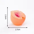 Miniature semi-cut peach luminous fruit charm showing dimensions 2.3cm height 2.7cm width - Pitted Peach