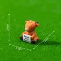 Miniature Highland cow figurine holding 'Brave And Wealth' sign for micro-landscape decor - Highland Cow / 1 Piece