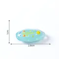 Miniature de limace de mer lumineuse en résine bleue, taille 2,8cm x 1cm - Lapin De Mer Lumineux / Bleu Jaune