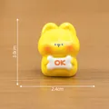 Yellow cartoon animal figurine holding OK bone sign for DIY micro landscape decoration - Holding Sign Dog / 2.4cm x 3.0cm