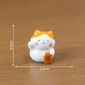 Cute small Japanese lucky cat figurine with golden fortune coin, 2.4 cm tall - 1 Piece / Luck-Bringing Style