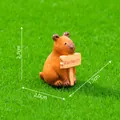 Miniature capybara figurine holding Perfect sign for DIY fairy garden decor (2.7cm) - Capybara Holding Sign