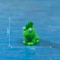 Miniature green frog figurine wearing a festive hat, size dimensions 1.8cm by 1.5cm - St. Patrick's Day Style (C3436) / 1.8cm x 1.5cm
