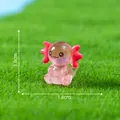 Miniature luminous pink axolotl resin figurine for micro landscape decor, 1.8cm height - Sitting Axolotl / Red