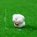 Statuetta di cane bianco in miniatura con fiocco rosso per decorazione da giardino fai da te - Cane