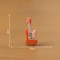 Modello di chitarra elettrica arancione in miniatura per decorazioni fai-da-te per case - Chitarra