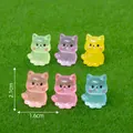 Six colorful miniature resin cat figurines on grass with size dimensions 2.1cm by 1.6cm. - Sitting Style / 1 Piece