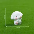 Miniature white dog figurine with pink cheeks and backpack, measuring 3.1cm in height. - Backpack Style / 3.1x3.0cm / White
