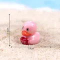 Miniature pink duck figurine holding a love heart for DIY micro landscape décor 1.9cm - Love Duck Style (C3223)