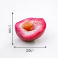 Miniature half-cut pink fruit model DIY decoration, dimensions 3.1cm by 2.0cm - Plum