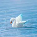 Simpatica statuina di cigno in miniatura con ali blu per decorazione di paesaggi - Blu