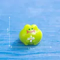 Miniature green frog figurine with white flower, dimension 1.1cm x 1.5cm for DIY decor. - Little Flower Frog (4#)