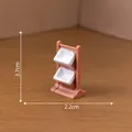 Miniature brown 2-tier dollhouse furniture display rack with white trays, size 3.7x2.2cm - 2.2x3.7cm