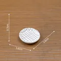 Miniature white round plate with black grid pattern for dollhouse decor, 3.6cm diameter - 3.6x3.6x0.7cm