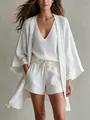 Elegant macro view of white three-piece linen lounge set with cardigan and shorts - S / Set / White