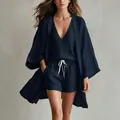 Macro detail of navy blue 3-piece lounge set featuring a loose cardigan and drawstring shorts - S / Set / Navy Blue