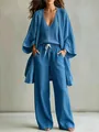 Detailed view of the blue three-piece linen set with cardigan and wide-leg pants - S / Top And Bottom / Dark Blue