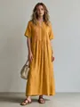 Full-length studio shot of a yellow V-neck pleated cotton linen casual long dress for women - Yellow / S