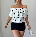 Stylish women's off-the-shoulder white blouse featuring large black polka dots and ruffles - S / Tops / White
