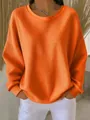 Vibrant orange crew neck sweatshirt with waffle knit texture and long sleeves. - S / Tops / Orange Red