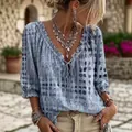 Light blue boho polka dot blouse with ruffled V-neck and tie detail for summer style - S / Tops / Blue