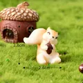 Miniature cute resin squirrel holding a nut for succulent garden decor, 2.8cm height - Squirrel with Pinecone (No. 5)