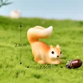 Miniature resin squirrel figurine with acorn for fairy garden decor, 2.8cm tall size - Leaning Squirrel (No. 2)