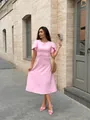 Elegant pink short sleeve dress with a flared skirt and cinched waist in urban setting - S / Dresses / Pink