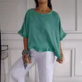 Blusa holgada de lino y algodón para mujer en color verde azulado con detalle volantes - S / Tops / Verde