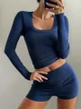 Close-up of navy blue ribbed yoga set showing long sleeve crop top and matching shorts fit. - S / Top And Bottom / Navy Blue