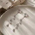 Boucles d'oreilles clips longues à pampilles en forme de feuilles en zircone - Clip d'oreille à Pampille en Strass Marquise (E5641) / Argent