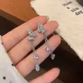 Elegant butterfly tassel earrings with silver needle and sparkling cat eye stone detail - Silver Zirconia Butterfly Tassel (Steel Post) (HDW022)