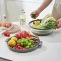 Faltbare Silikon-Abdeckhaube für Obst und Gemüse, hitzebeständig und vielseitig einsetzbar. - Grau
