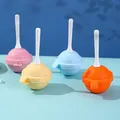 Set of four colorful lollipop-shaped silicone popsicle molds in pink, blue, orange, and yellow - 1 Piece / Multicolor