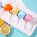 Mini silicone lollipop ice pop molds in four bright colors displayed on a white tray - 10 Pieces Pack / Multicolor
