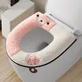 Warm and plush pink and white color-block toilet seat cover with cute bear design and handle - Pink