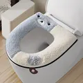 Plush bear-themed toilet seat cover in blue and cream with handle and embroidery - Blue