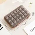 Portable brown transparent pill organizer with 21 compartments for 7 days - 18x12x3.6cm / Transparent Coffee