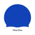 Detailed view of the high-elasticity deep blue silicone swimming cap for adults - Dark Blue